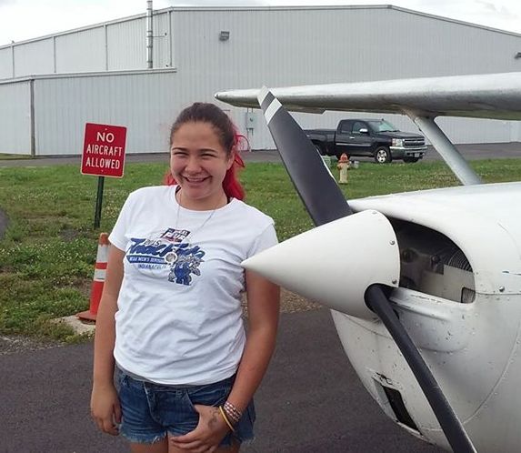 Isabelle with Cessna 150, N22648, LWB
