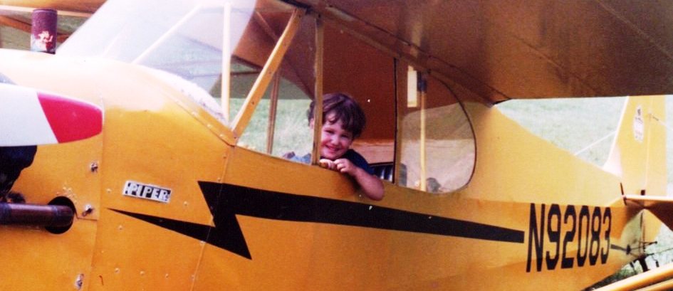 Benji Hersman as kid in 1946 Piper Cub